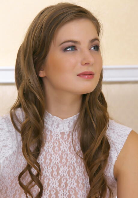 Luscious brunette teen Kate E in underwear uncovers small tits and spreads her legs 