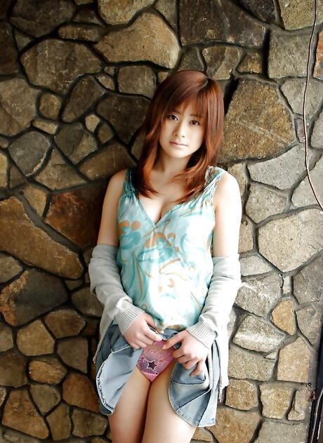 Appealing japanese babe Sumire Aida bares big boobies and sexy butt 