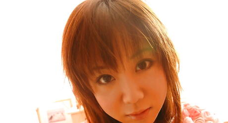 Hot japanese young Maki Hoshino in panties showing big hooters and spreading her legs 