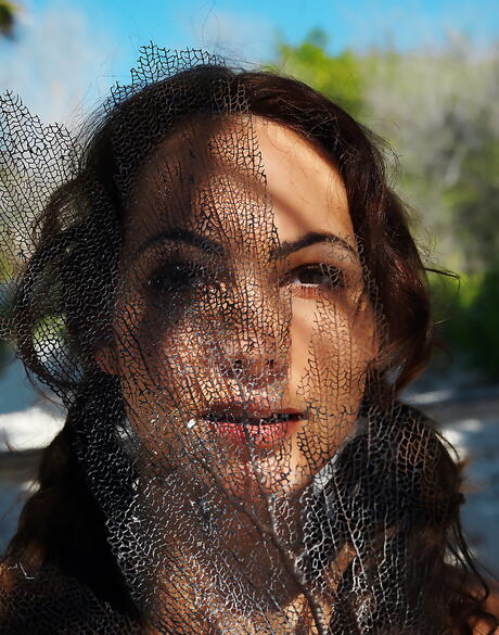 Excellent cutie Gabriela Munzar exposes big boobs and spreads her legs on the beach