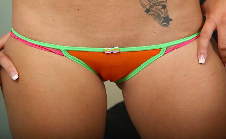 Shapely blonde teen Sophie Ryan shows her ass in skirt and spreading her legs 