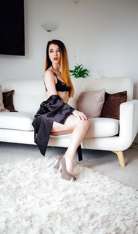 Deluxe polish redheaded Misha Cross exhibiting her butt 