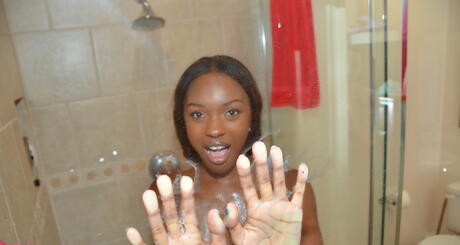 Enchanting black babe Armani Monroe reveals big knockers and masturbates with dildo in shower