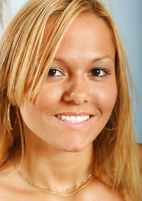 Very attractive blonde teen Arianna exhibiting big titties and masturbating 