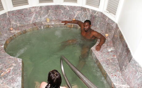 Hot american brunette Jodi Taylor sucking hot huge black cock and takes a cum shot on her face near the pool