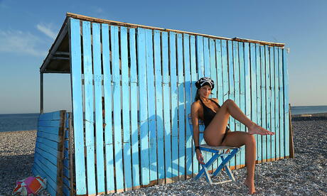 Foxy teen Melena A in hot bikini shows tiny tits and spreads her legs at beach