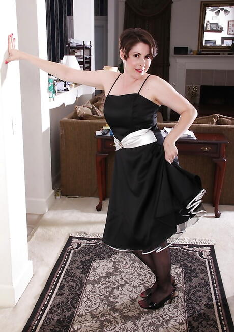 Hot milf Sadie Jones in fancy skirt reveals big tits and spreads her legs 