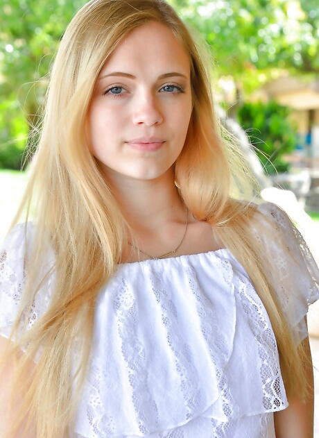 Luscious american blond teen Alex Grey exposes big hooters and vagina outdoor