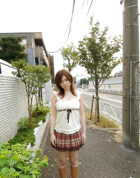 Foxy japanese teen Nami Ogawa exhibiting big titties and hairy pussy 