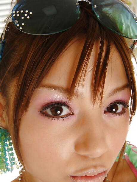 Sultry japanese Rio in sexy stockings unveils tiny tits and sexy ass 