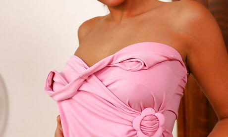 Slim teen Adela in nice skirt denudes big titties and butt 