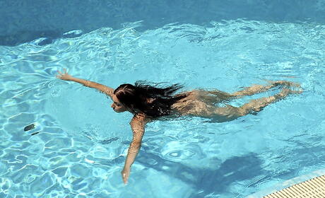 Very attractive hungarian cutie Mira Sunset revealing big hooters and jerking off at pool