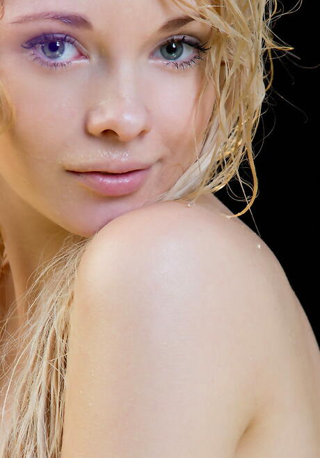 Sylphlike blonde young Feeona A uncovering tiny tits and spreading her legs outdoor