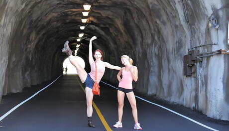 Slim cuties Lena Nicole and Melody Jordan in fancy shorts make some playful lesbian action outdoor