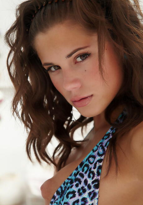 Luscious czech brunette teen Little Caprice denudes tiny tits and bald pussy 