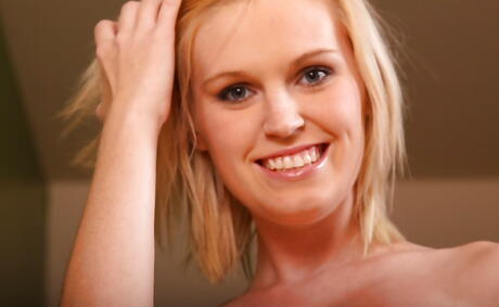 Luscious american blonde youthful Amanda Bryant in underwear uncovering tiny tits and spreading her legs 