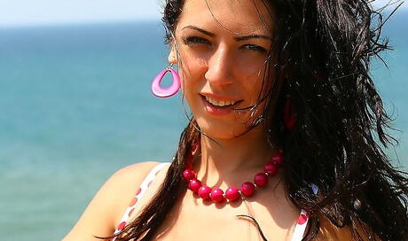 Sexy ukrainian brunette teen Merilyn Sakova exposing big boobies and ass outside