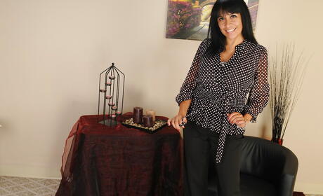 Very attractive american dark-haired mature Isabella Montoya in undies exhibits big hooters and butt 