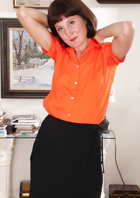 Hot mature Meredith Johnson showing tiny tits and spreading her legs 