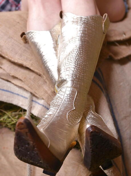 Deluxe women Athina and Nesty in shorts enjoy some playful lesbian action 