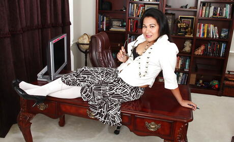 Delightful oriental mature Susie Jhonson in lingerie uncovering tiny tits and spreading her legs 