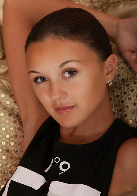 Stunning teen Veselin unveils small tits and shaved pussy 