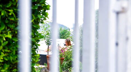 Alluring american hottie Layla London in fancy bikini showing big hooters and masturbating outdoor