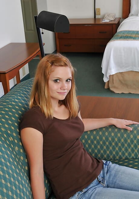 Stunning teen Brittny exposes tiny tits and pussy 