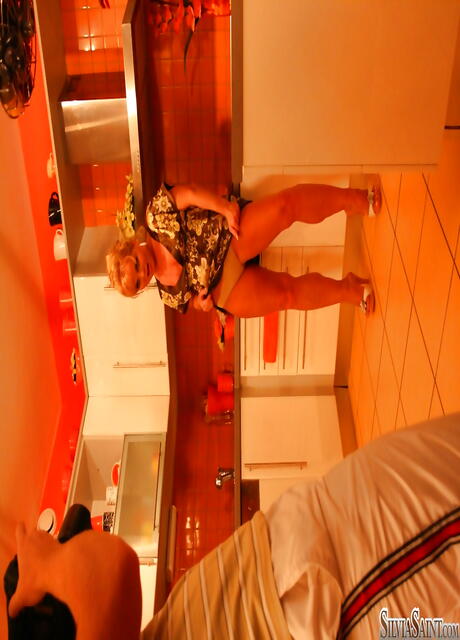 Hot czech milf Silvia Saint exhibits her ass in and masturbating with sex toy in the kitchen