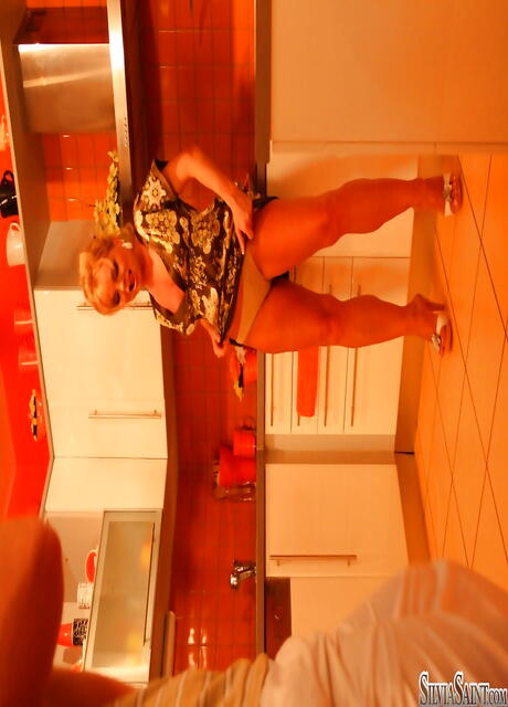 Hot czech milf Silvia Saint exhibits her ass in and masturbating with sex toy in the kitchen