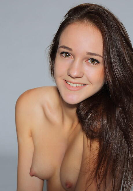 Foxy brunette young Valensia in hot undies shows small tits and shaved pussy 