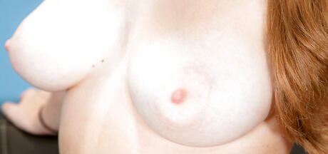 Peachy american cutie Emily Harper exhibiting big hooters and hot butt 