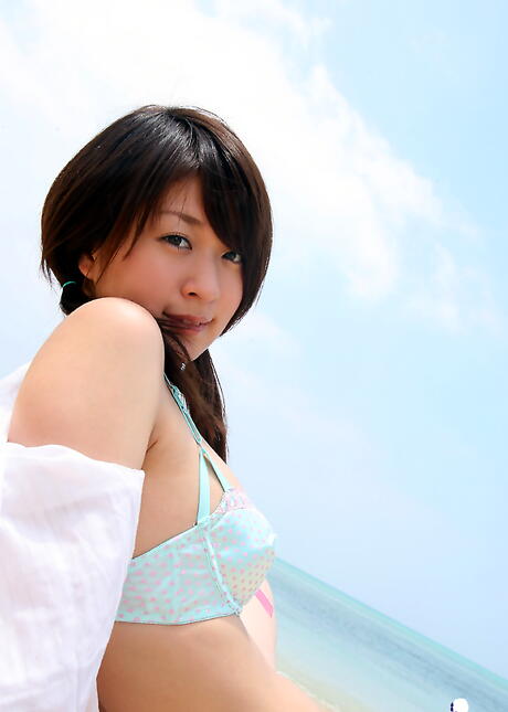 Curious japanese hottie Risa Misaki in panties shows her ass on the beach