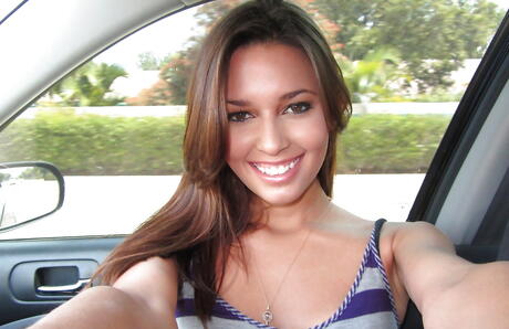 Svelte latin youthful Kiarra Wolfe takes off her clothes outdoor