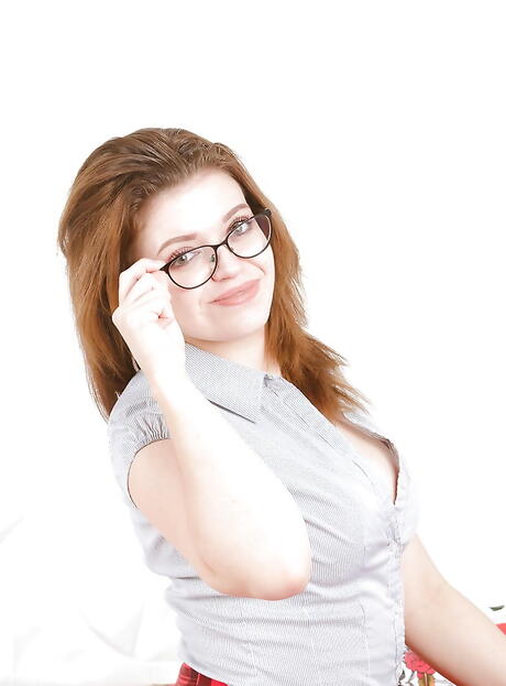 Very attractive youthful Tiffany Black in uniform showing big boobies and spreading her legs 