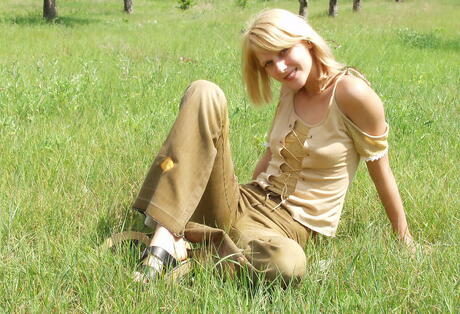 Very attractive blonde teen Tanya in sexy undies showing shaved pussy outdoor