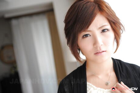 Hot japanese brunette Kaede Oshiro in strange fetish gallery in kitchen