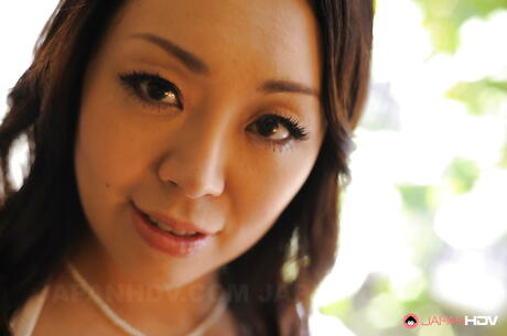 Shapely japanese dark hair hottie Yuna Yamami in skirt exposes tiny tits and hairy pussy 