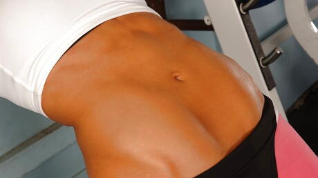 Very attractive blond bombshell Sandy exhibits her butt in and spreads her legs 