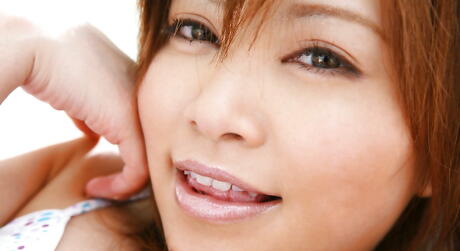 Very attractive japanese hottie Hitomi Yoshino bares big titties and hot ass 