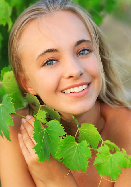 Slender ukrainian blonde teen Rachel Blau revealing big titties and sexy butt outside