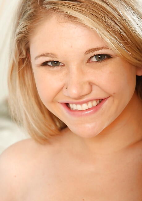 Hot blond young Kali exhibits her butt in underwear and shaved pussy 