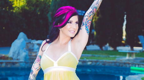Lovely american milf Joanna Angel in sexy skirt denudes big tits and hot butt near the pool