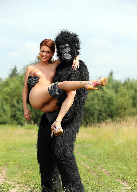 Superb red-haired Becca A uncovering tiny tits and spreading her legs outdoor