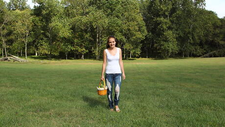 Sexy brunette young Sadie Grey exposes her ass in sexy jeans and puts a toy in her pussy outdoor