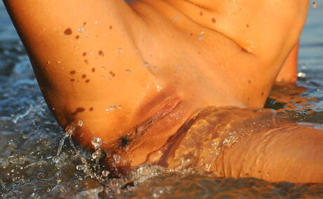 Svelte teen Suzanna A in beautiful bikini exposing big titties and shaved pussy at beach