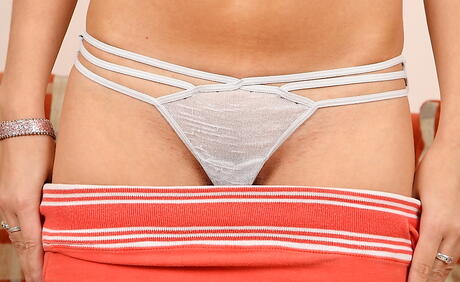 Glamorous brunette milf Jaclyn exposing big tits and spreading her legs 