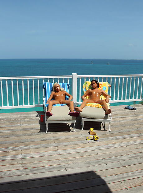 Slim beauties Kacey Jordan and Tanner Mayes in fancy shorts licking hot pussies and playing with dildo outside