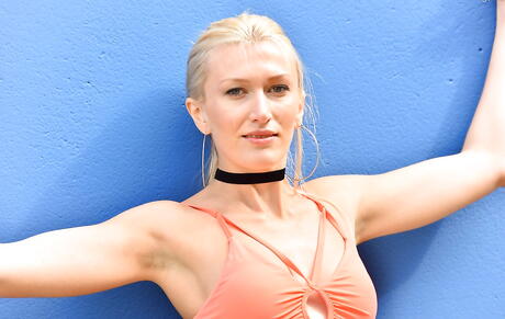 Sylphlike blond milf Angelina showing small tits and spreading her legs outdoor