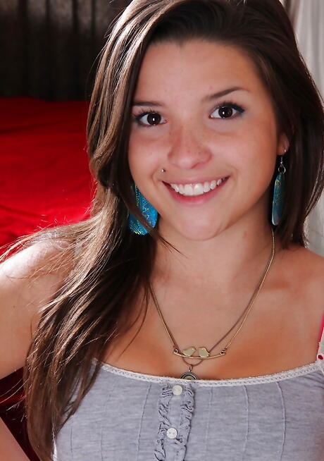 Svelte american brunette young Veronica Berry in sexy shorts exhibits tiny tits and spreads her legs 